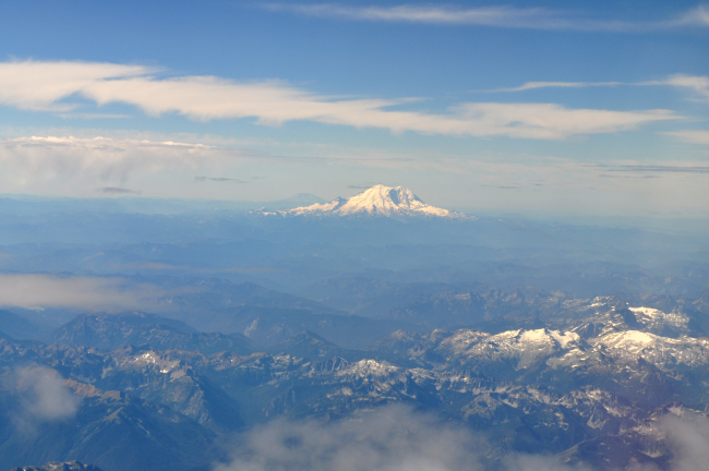 Mount Rainier seen over the Cascades with Mount Baker in the background