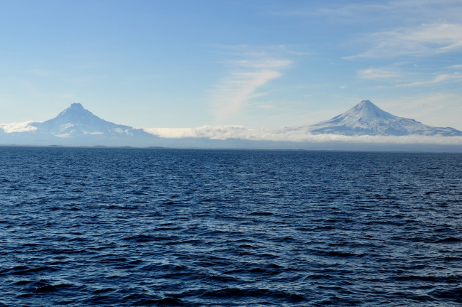 Shishaldin Volcano on the right and Isanotski Volcano on the left as seenfrom the Bering Sea side of the Aleutian Islands