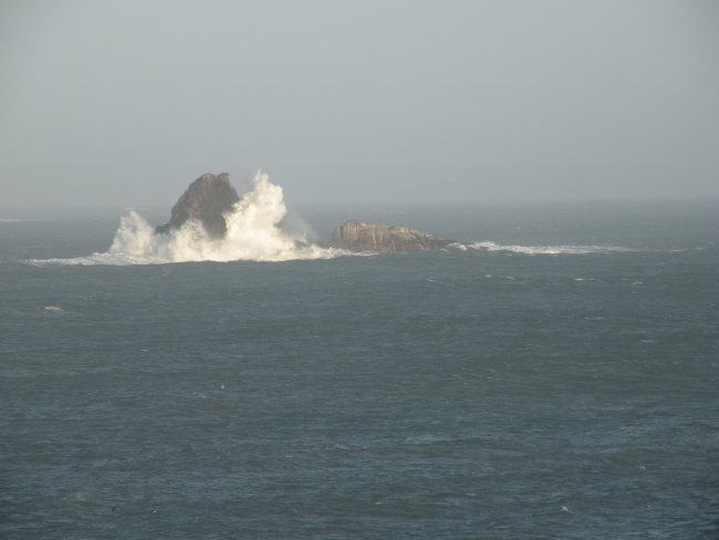 Waves crashing along offshore rocks near Point Piedras Blancas
