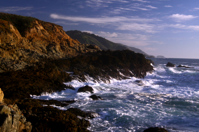 Rivulets of sea water running off the rocks of the Granite Canyon area aftera large wave broke against the coast here