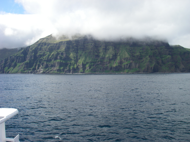 Layer upon layer of volcanic flows formed this cliff on Unimak Island