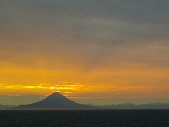 Sunset on Augustine volcano at the SW end of Cook Inlet