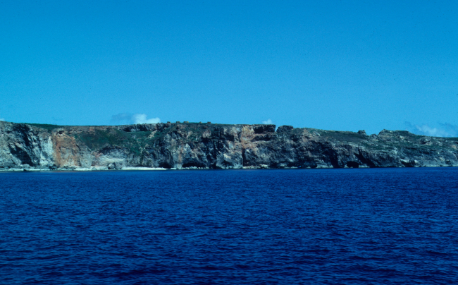 Sea caves along the Pagan Island shoreline