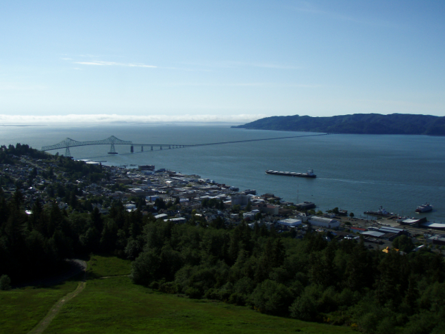 A merchant vessel approaching the Astoria-Megler Bridge as it isoutbound headed to the Pacific Ocean