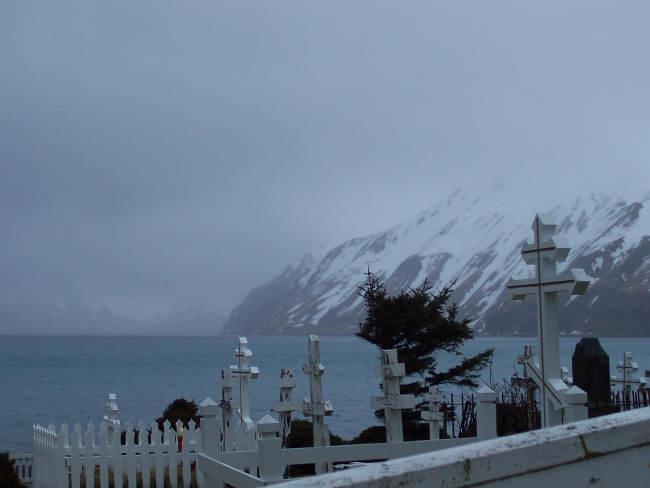 Crosses at the Russian Orthodox Cemetery at Dutch Harbor on  a gray and winteryday