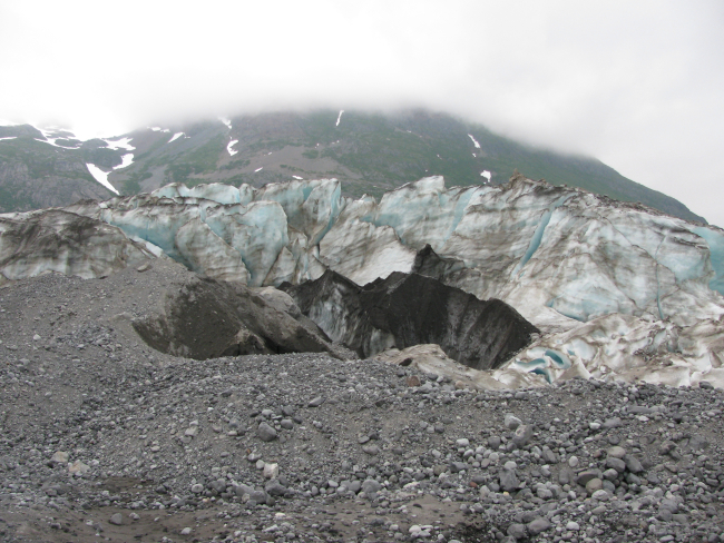 Glacial moraine rocks at the edge of Hallo Glacier