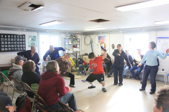 Crew of NOAA Ship FAIRWEATHER invited to dance with native dancers onLittle Diomede Island