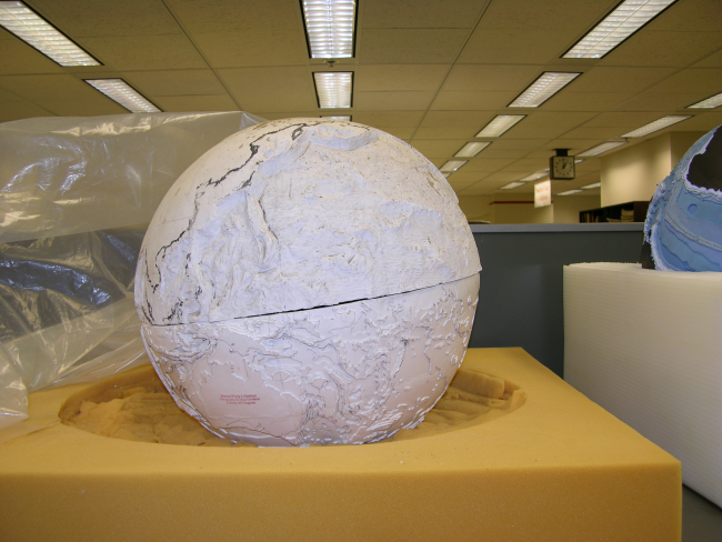Stages in the production of the famous basketball bathymetric globe produced byBruce Heezen and Marie Tharp in their quest to understand the physiography ofthe seafloor