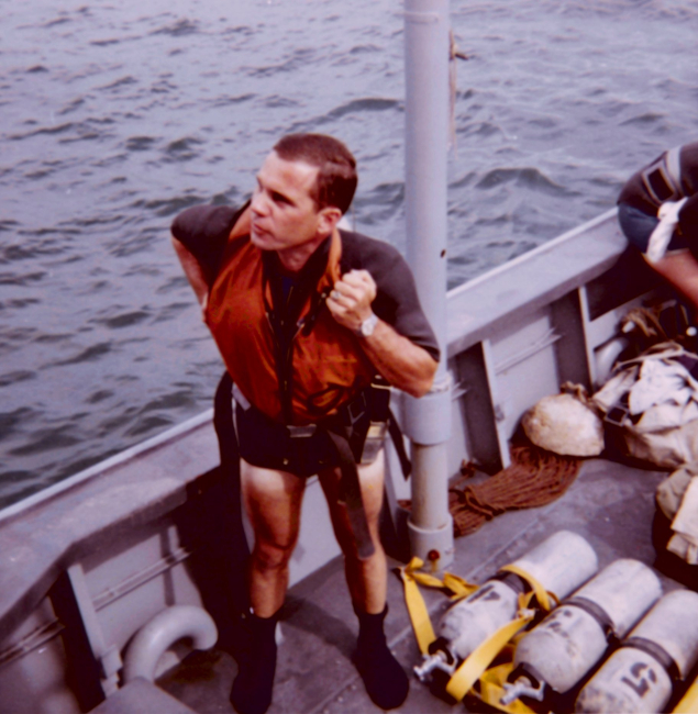 Dick Rutkowski donning scuba gear
