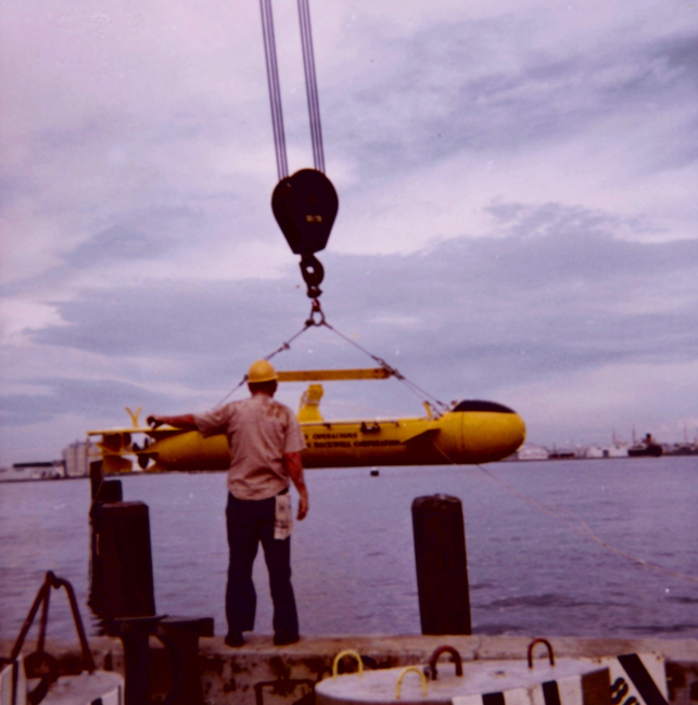 Diver sled being lowered for test during Project FLARE,the Florida Aquanaut Research Expedition