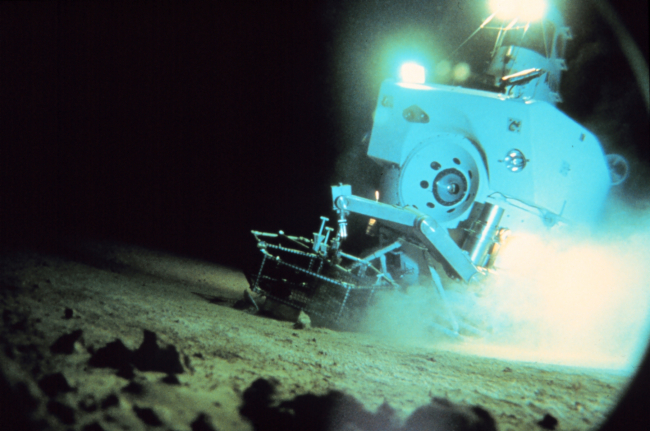 DSV Alvin sets a lander basket with tube cores on the bottom