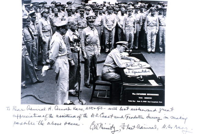 Copy of Admiral Chester Nimitz signing Japanese surrender document at the end of World War II