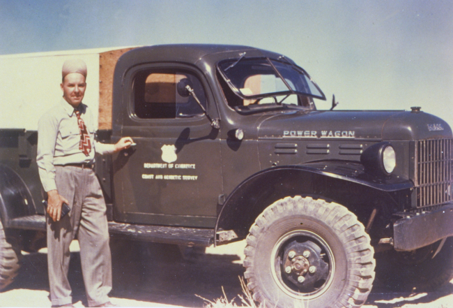 Party chief, Lieutenant Commander Marvin Paulson, somewhere in the westernstates, with his Dodge Power Wagon