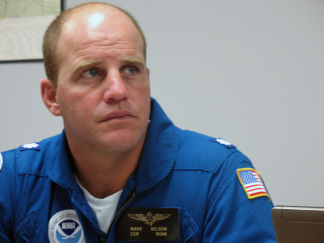 P-3 pilot Commander Mark Nelson at briefing prior to flying into Hurricane Ike