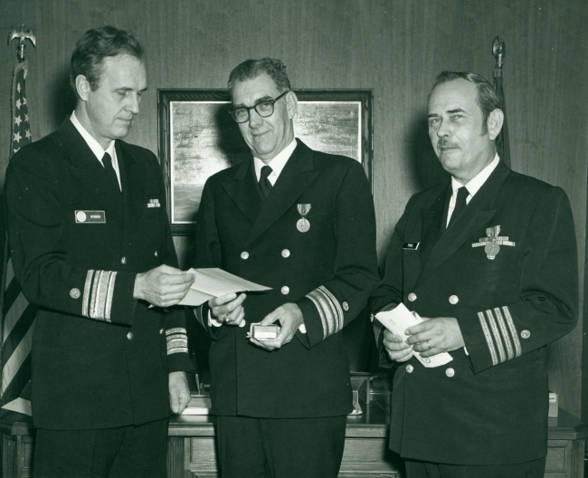 Rear Admiral Harley Nygren, first director of NOAA Corps, with Rear AdmiralAllen Powell, head of the National Ocean Survey, and Captain Miller J