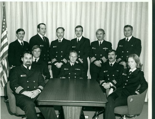 Meeting of NOAA Corps officers presided over by Rear Admiral Harley Nygren incenter sitting