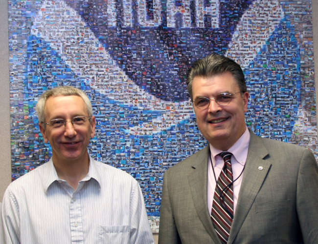 Craig McLean on right, Deputy Assistant Administrator of NOAA's Office ofOceanic and Atmospheric Research