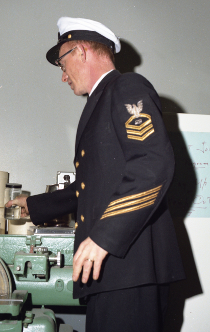 A Coast and Geodetic Survey Chief Electronics Technician with three gold hashmarks denoting over 12 years of service and no disciplinary actions