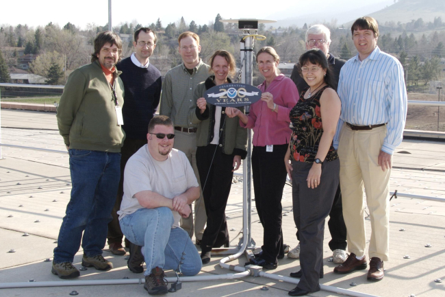 Members of NOAA's National Geodetic Survey Continuously Operating ReferenceStations (CORS) program members on the rooftop of NOAA's David Skaggs ResearchCenter