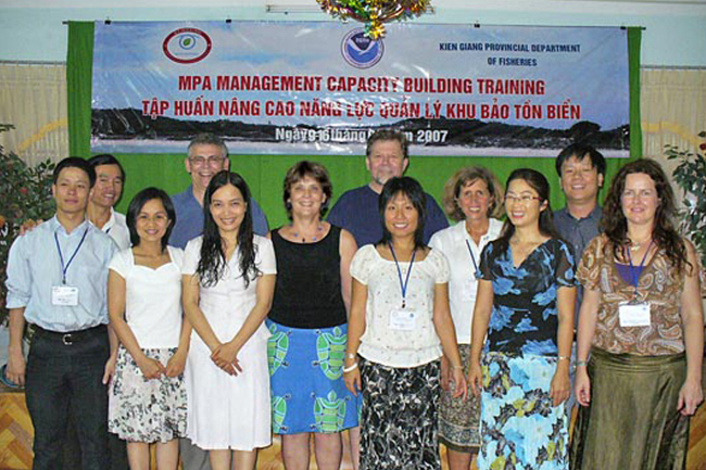 Fulfilling the National Marine Sanctuaries Act mandate to cooperate with othergovernments in the protection and management of special marine areas, aNOAA team comprising from L-R George Galasso, Ann Weaver, Bob Steelquist, andAnn Walton, as well as Paula Brown ( R at end) worked with Vietnamese mentors in training a management team for the soon to be designated Phu Quoc MPA