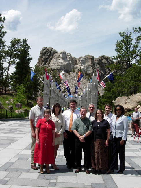 After addressing the Western Governors Conference in Deadwood, South Dakota,NOAA Chief of Staff Scott Rayder joins several of the staff of the Rapid City,SD Weather Service Forecast staff at Mount Rushmore