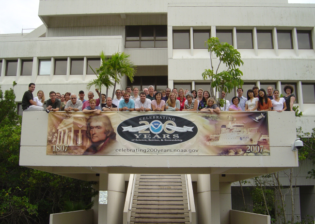 The Physical Oceanography Division of NOAA's Atlantic Oceanographic andMeteorological Laboratory poses for a group photo outside of AOML