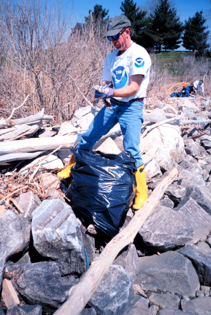 Roger Griffis of NOAA assists in the clean-up at Ft