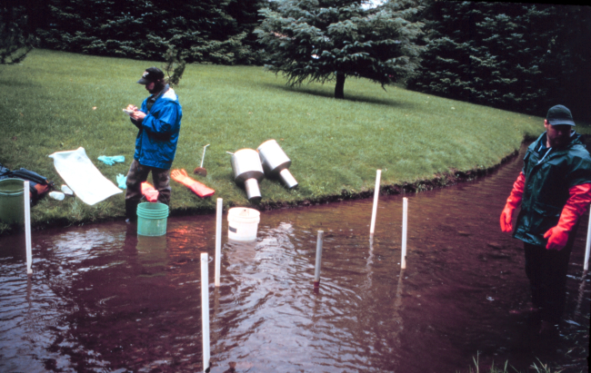 A scientist prepares to do sampling for gravel cleanliness and dissolved oxygenlevels