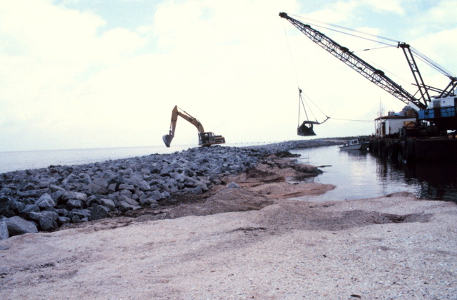 A view from canal side of the final placement of rock