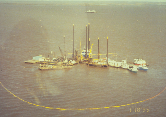 An aerial view of the boom used to contain the spill at Dixon Bay