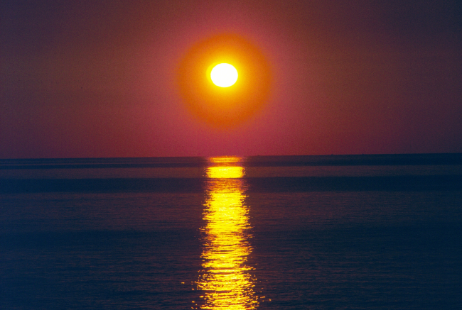 The sun sets over Narragansett Bay, RI mid-spring
