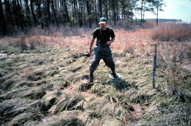 Dave Meyer in the marsh boots he designed to walk on the marsh platform