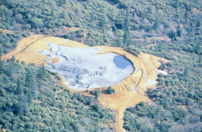 A containment facility or tailings impoundment area