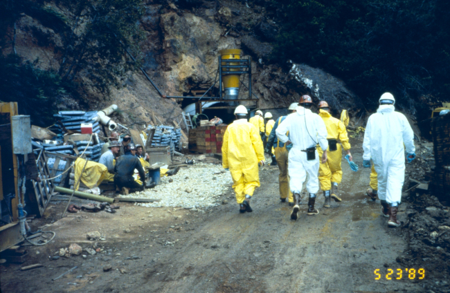 A group wears protective clothing as they enter one of the portals at IronMountain Mine