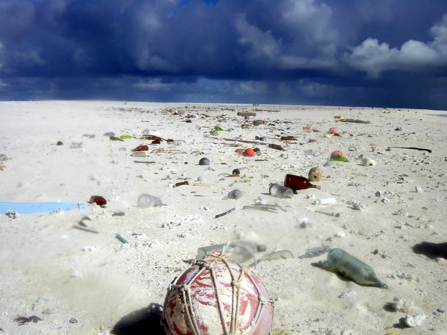 Human debris covers the sands of Pearl and Hermes Atoll