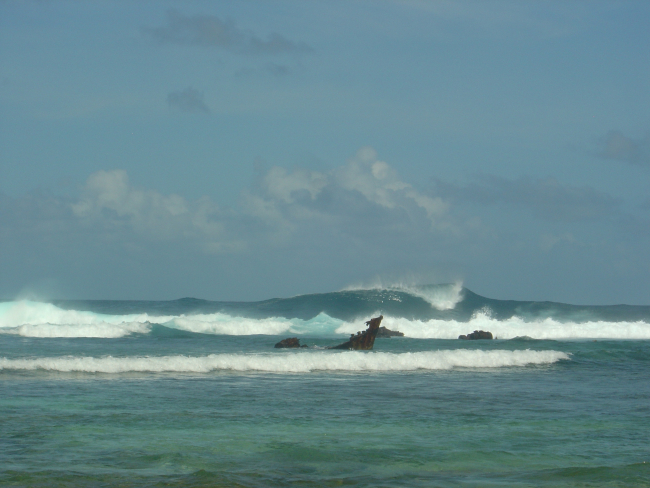 Annuu shipwreck seen in the surfline as large waves pummel the reef