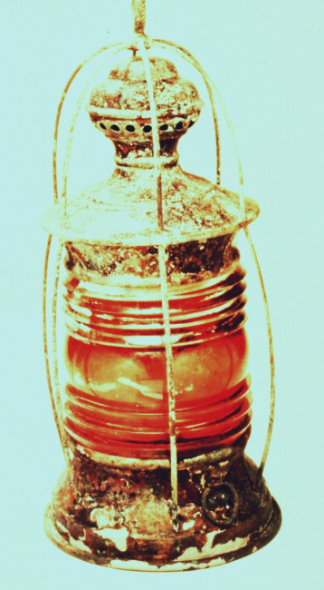 This brass signal lantern was the first artifact recovered from the MONITOR