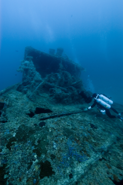 A diver on the bow of the NORTHERN LIGHT, a shipwreck in 190 feet waterdepth
