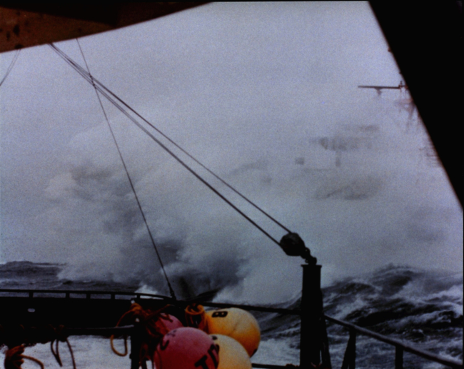 NOAA Ship MILLER FREEMAN approaching a disabled vessel in the Bering Sea