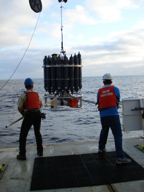 Johnny and Pedro recovering a CTD instrument and water sampling array