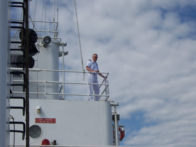 Captain Ray Slagle conning the NOAA Ship THOMAS JEFFERSONwhile coming alongside