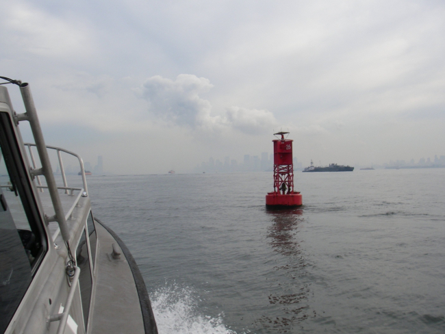 Survey launch off NOAA Ship THOMAS JEFFERSON underway in NewYork Harbor with Manhattan ahead