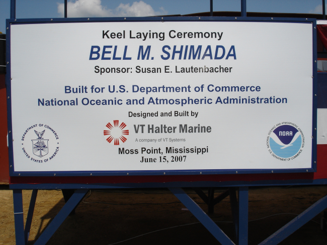 Sign proclaiming keel laying ceremony of NOAA Ship BELL M