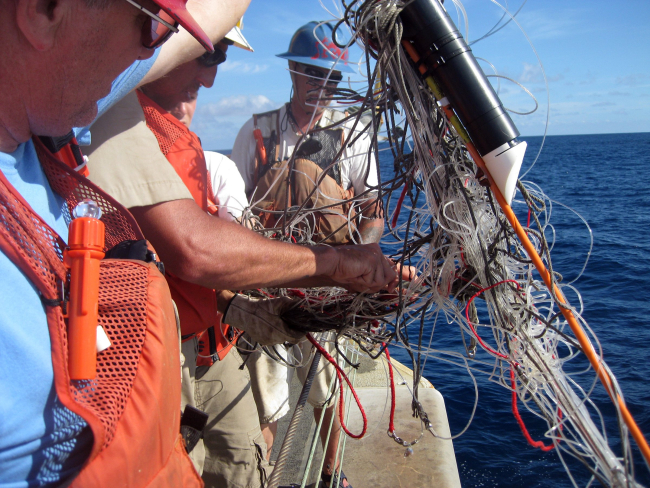 Recovering derelict longline monofilament fishing line, a form of marine debris, for disposal on board the OSCAR ELTON SETTE