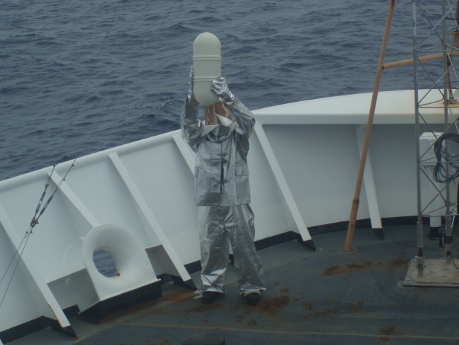 Wearing fire proof suit during simulated helicopter operations on NOAA ShipKA'IMIMOANA (R333)
