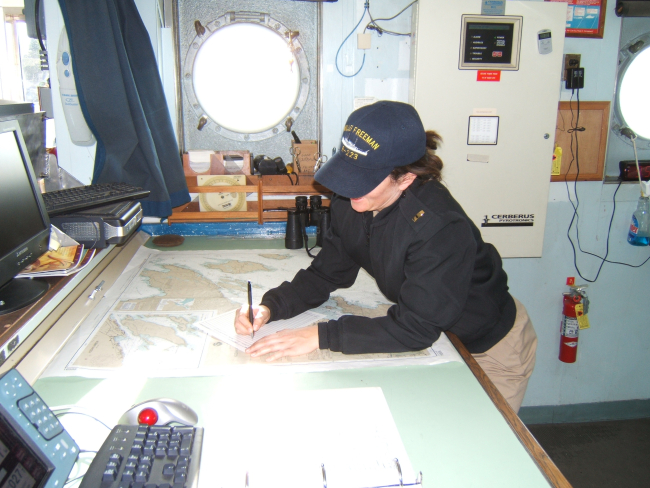 Writing up the log on the NOAA Ship MILLER FREEMAN