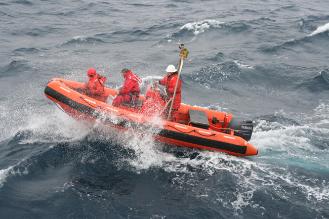 NOAA Ship MILLER FREEMAN rigid hull inflatable boat operating in choppy seas
