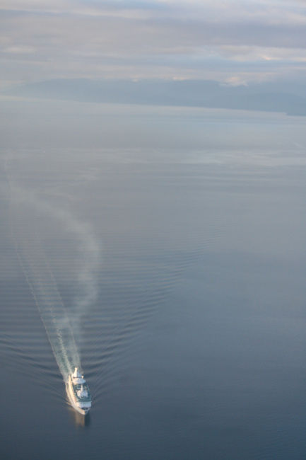 Cruise ship at sunset during a flight home after a successfulNOAA-led humpback whale disentanglement
