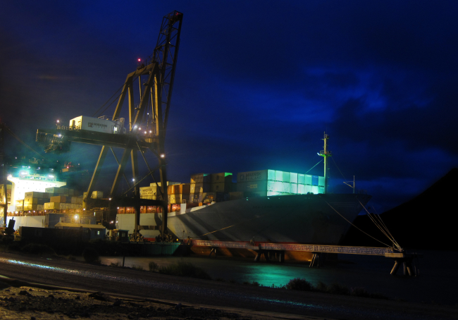 Containership working cargo at night