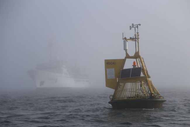 NOAA Ship FAIRWEATHER servicing weather buoy 46041 off the Washingtoncoast between Aberdeen and Cape Flattery on a foggy summer day